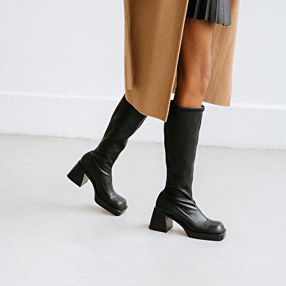 High boots with square toes in black synthetic