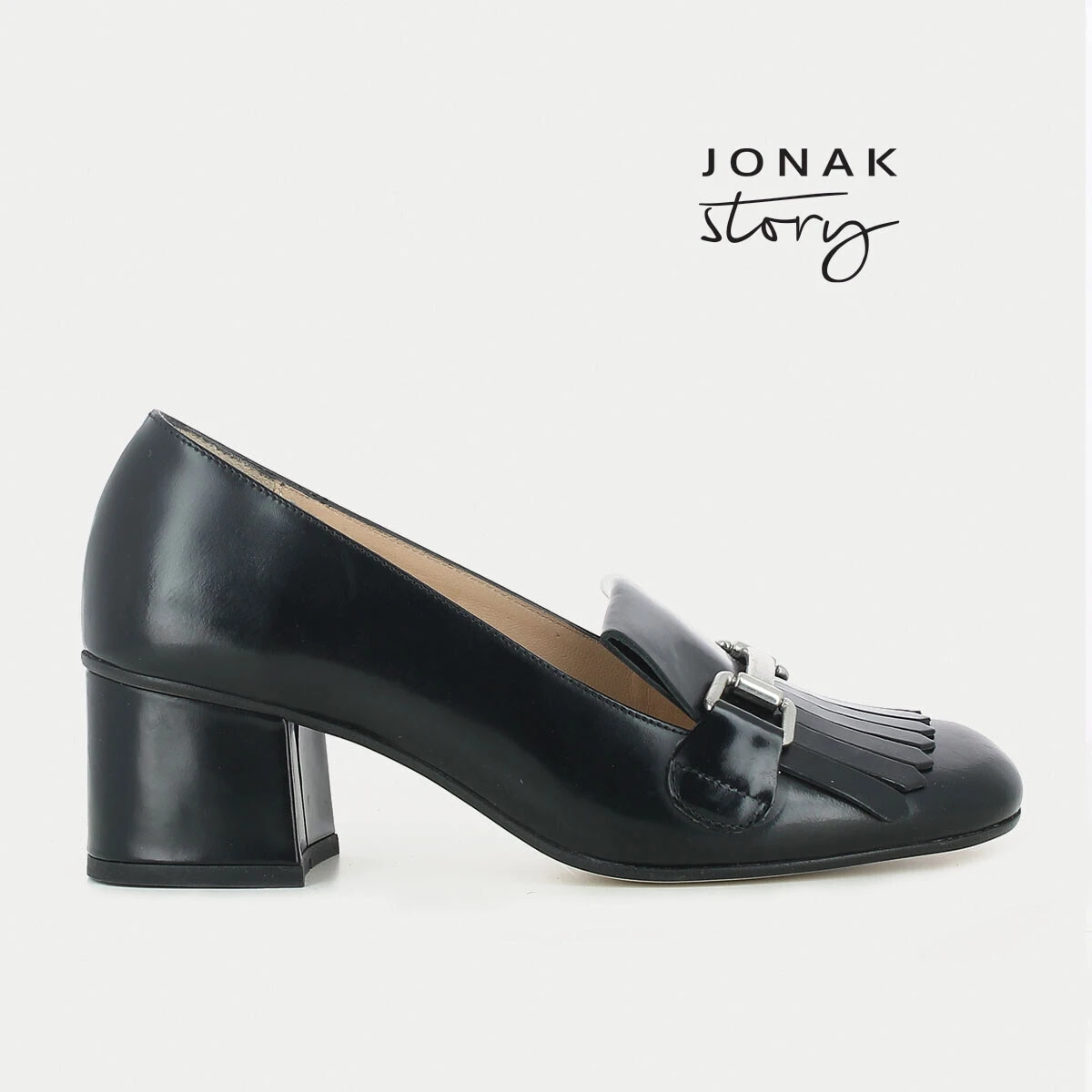 Black moccasins with heel, bit-style bar and fringed tab | VALVI