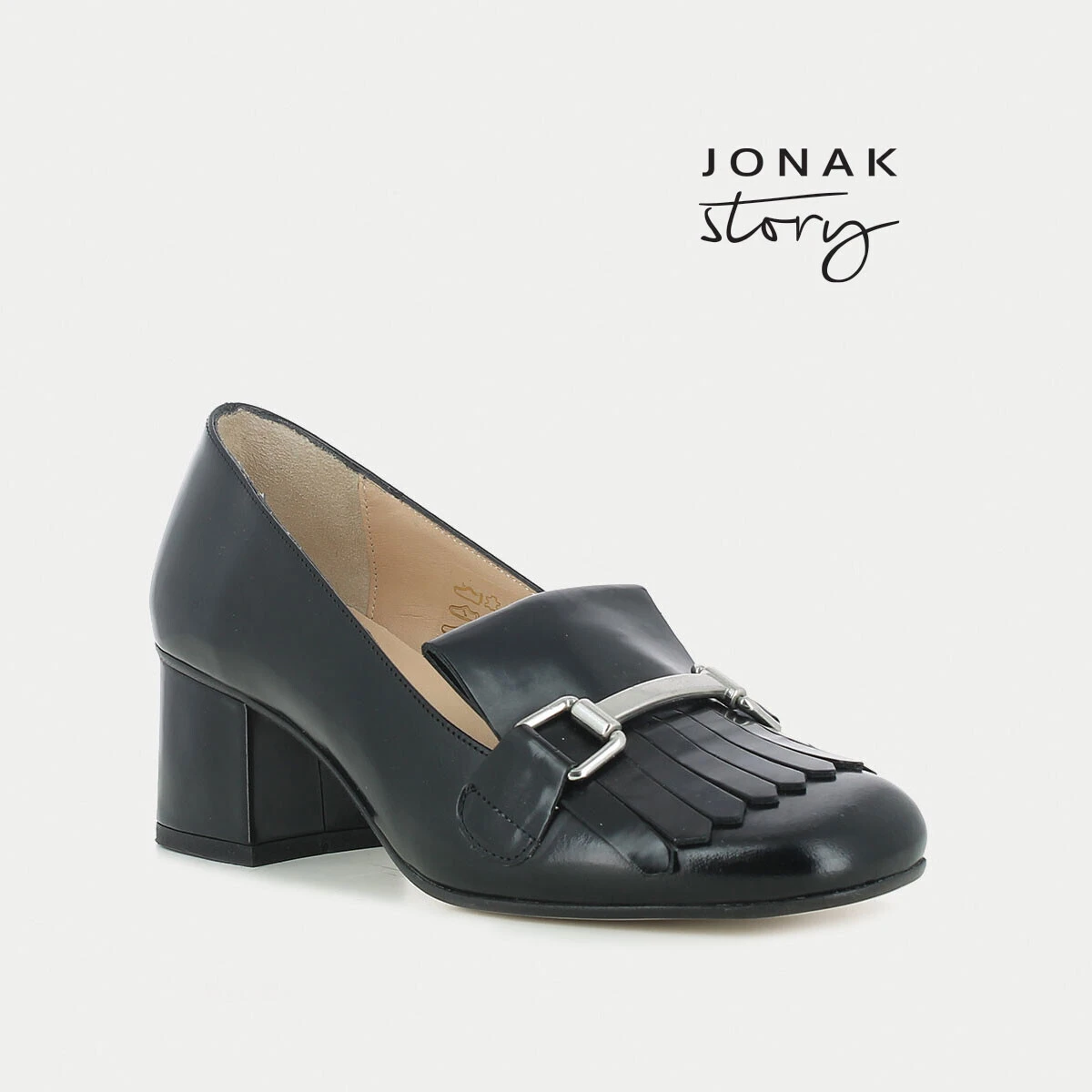 Black moccasins with heel, bit-style bar and fringed tab | VALVI