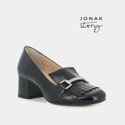 Black moccasins with heel, bit-style bar and fringed tab | valvi