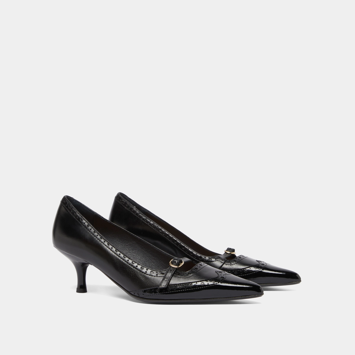 Strappy pumps with perforated details in black patent and black leather | DALTA