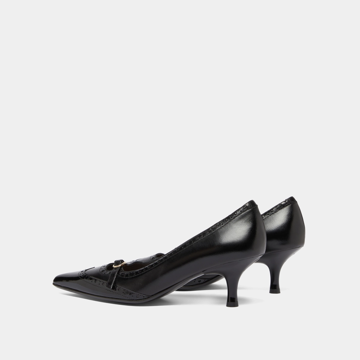 Strappy pumps with perforated details in black patent and black leather | DALTA
