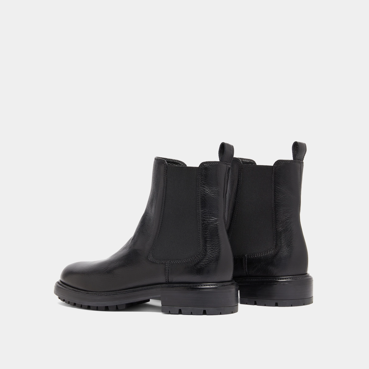 Lowboots with elastic straps and notched soles in black grained leather | CELINA
