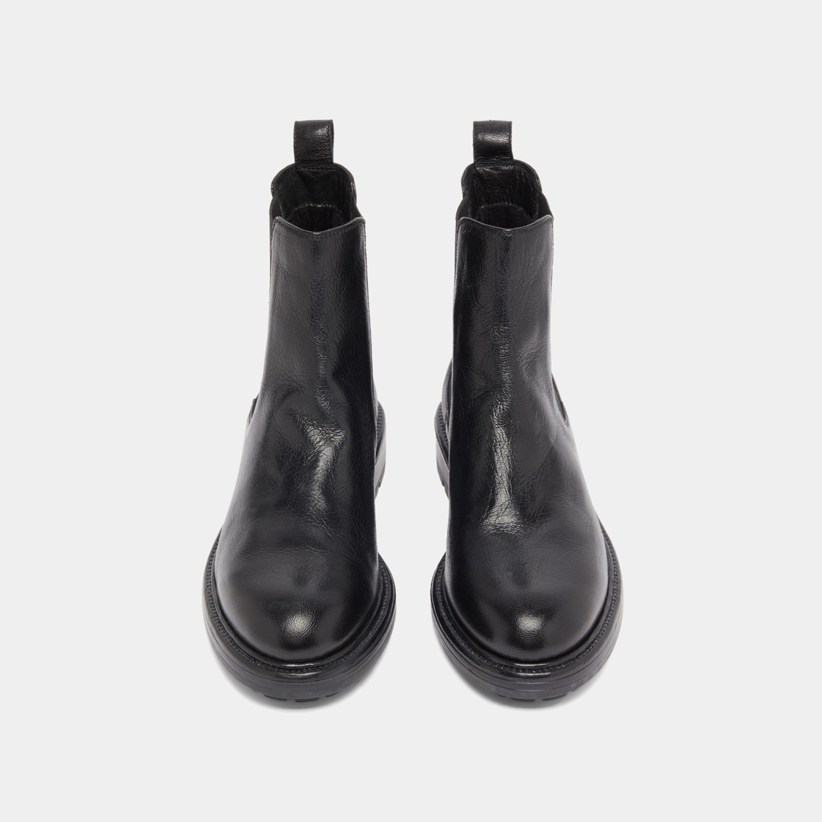 Lowboots with elastic straps and notched soles in black grained leather | CELINA