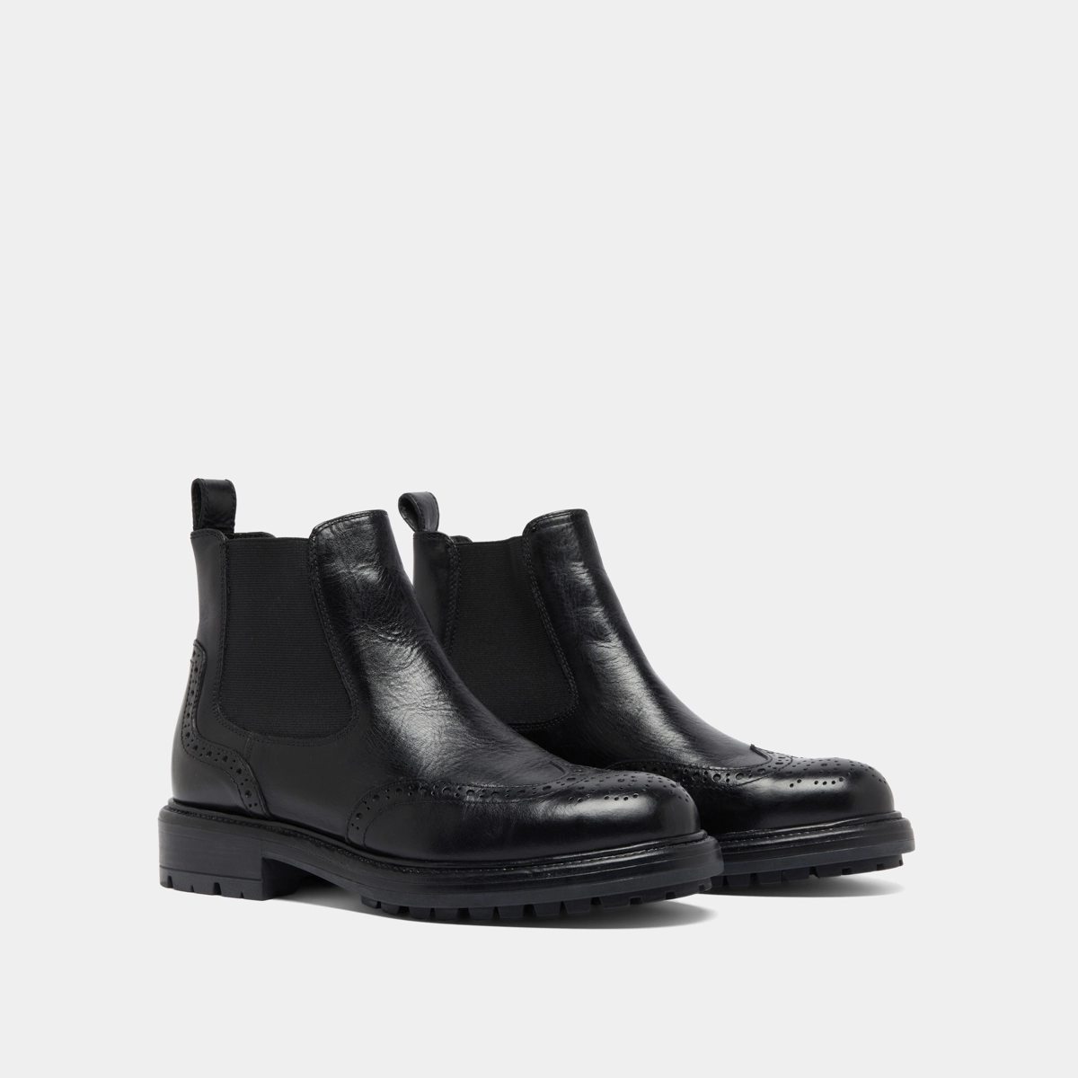 Lowboots with notched soles in black leather | CELIA