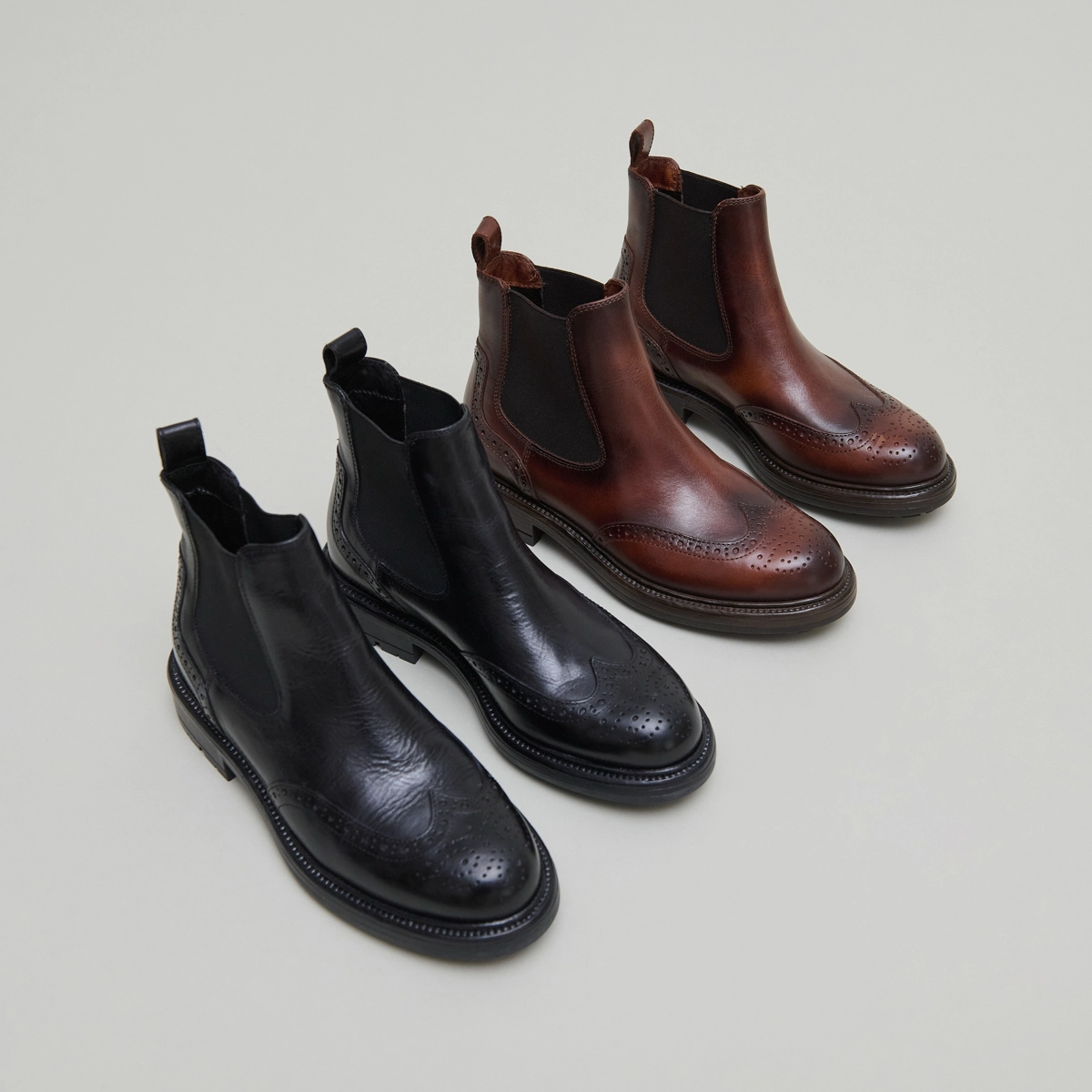 Lowboots with notched soles in black leather | CELIA