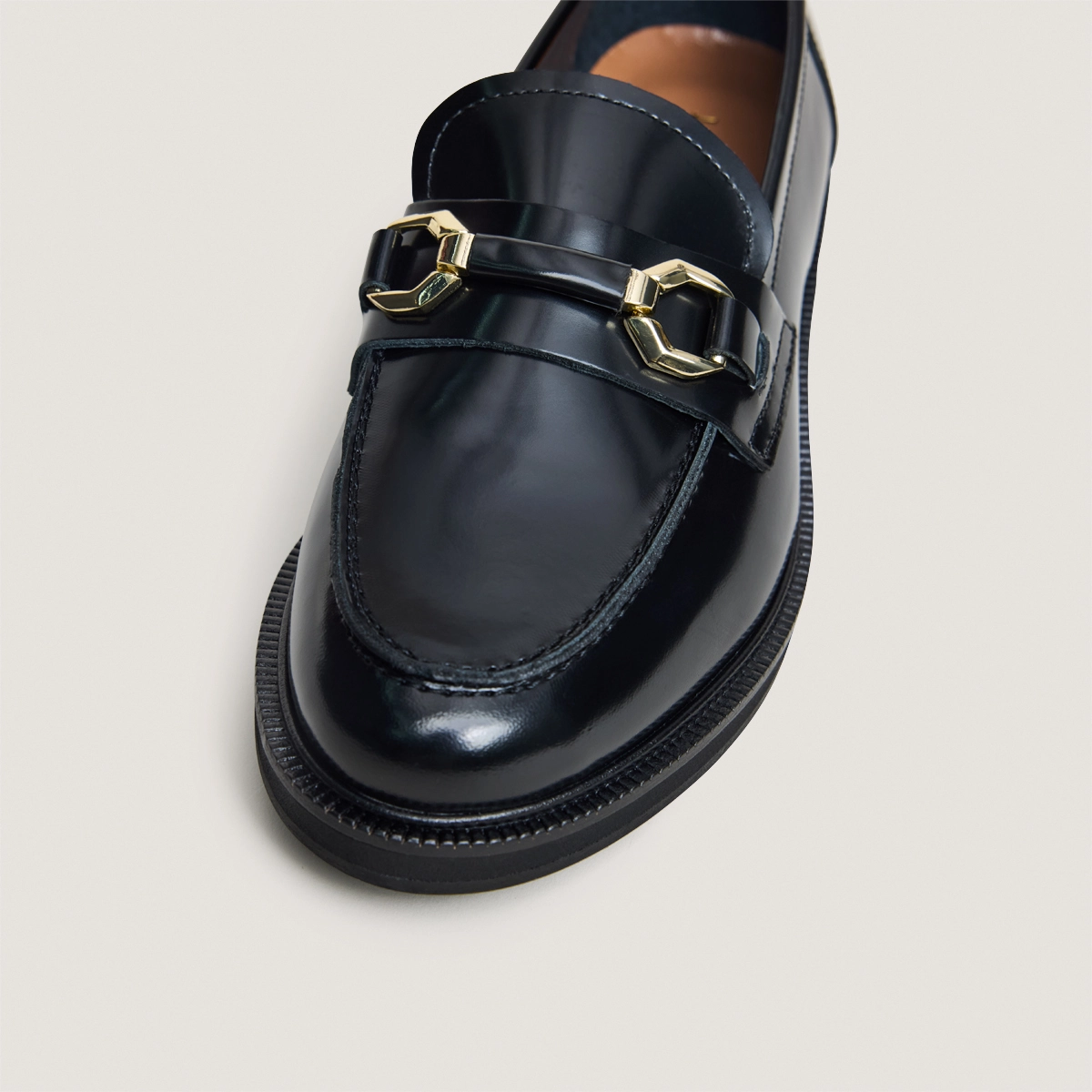 Loafers with gold bits in black glazed leather | DROP
