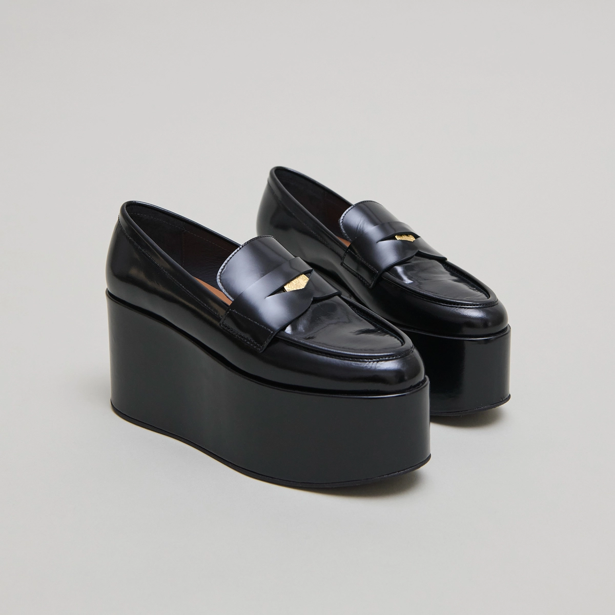 Platform loafers in black glazed leather | DOPO
