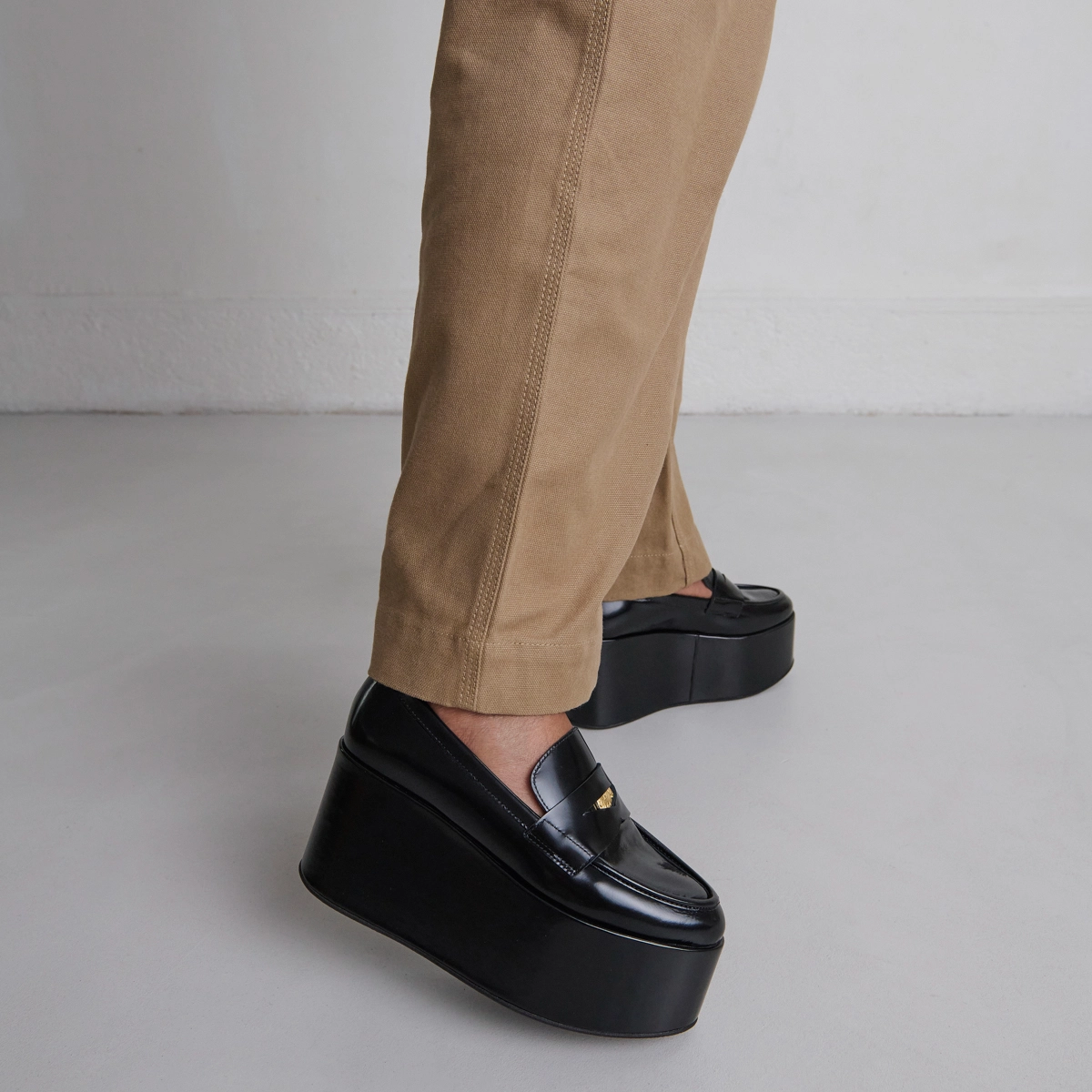 Platform loafers in black glazed leather | DOPO