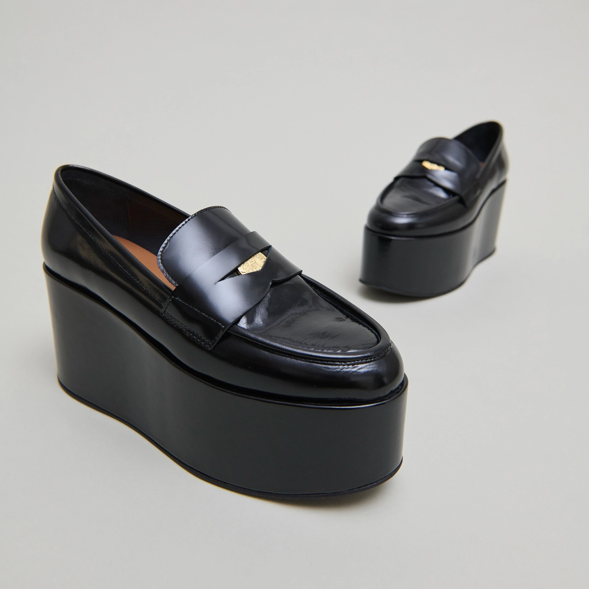 Platform loafers in black glazed leather | DOPO