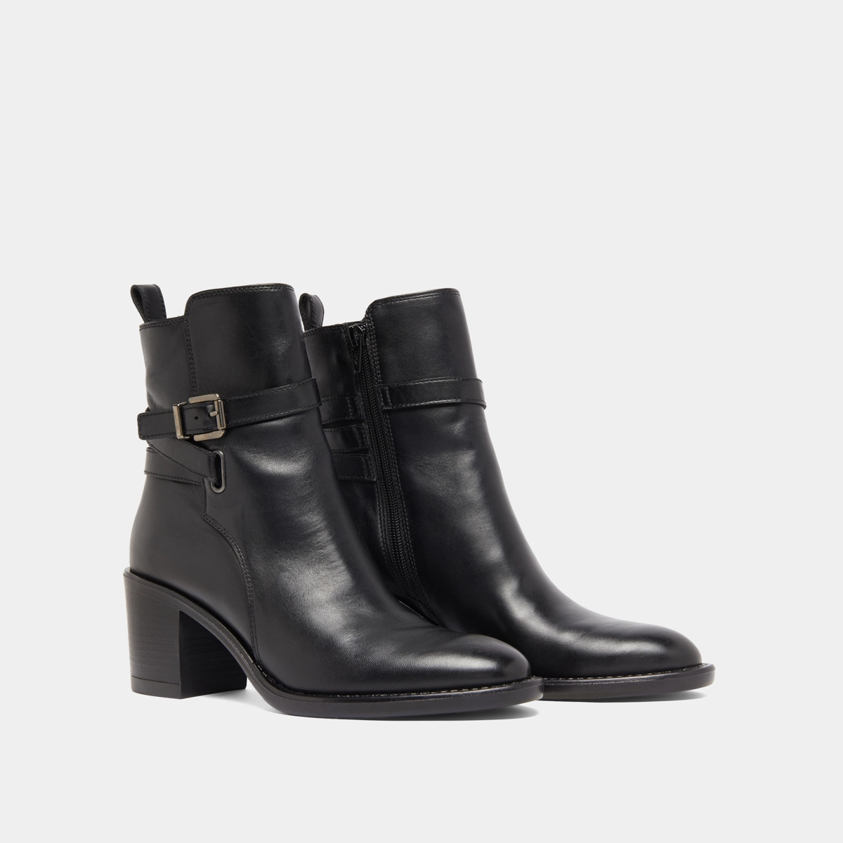 Heeled ankle boots and buckles in black leather | CAJOU