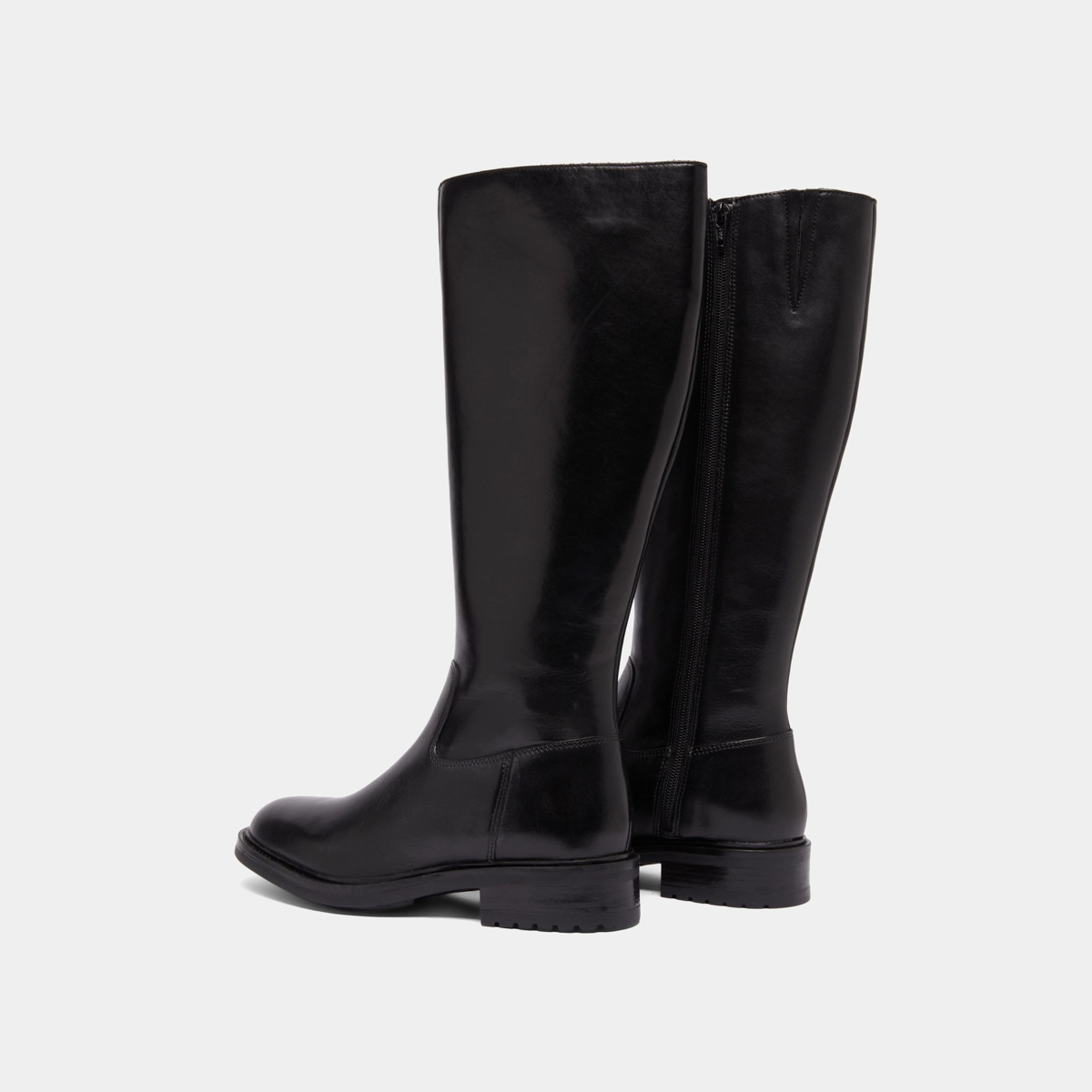 Boots with notched heels in black leather | GRACIANA