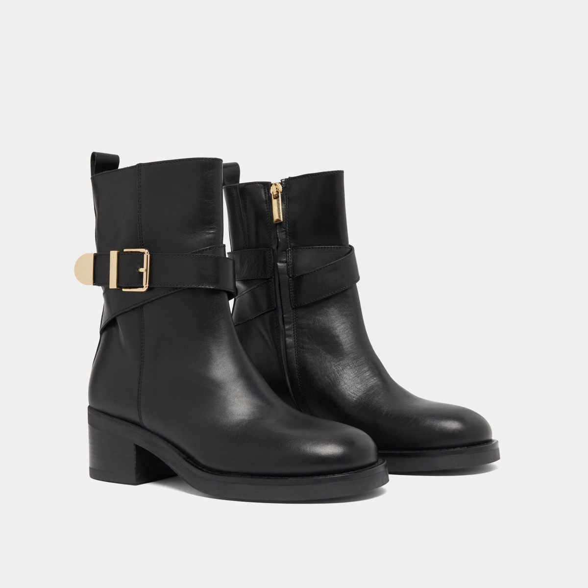 Buckle ankle boots in black leather | IMA