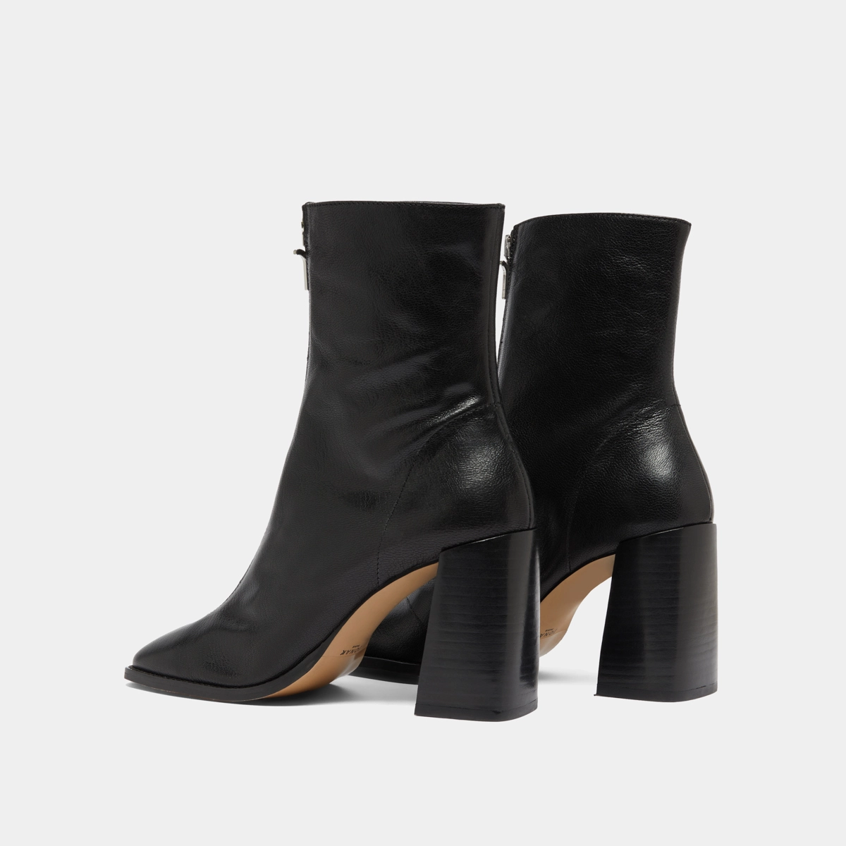 Heeled ankle boots with zip in black leather | VANDANA