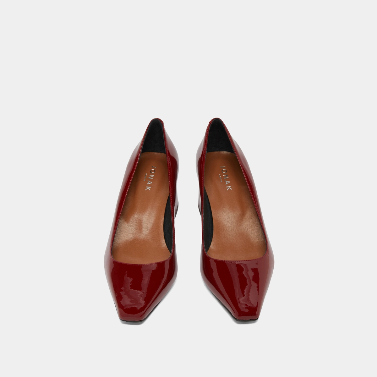 Heeled pumps in carmine red patent | DULINA