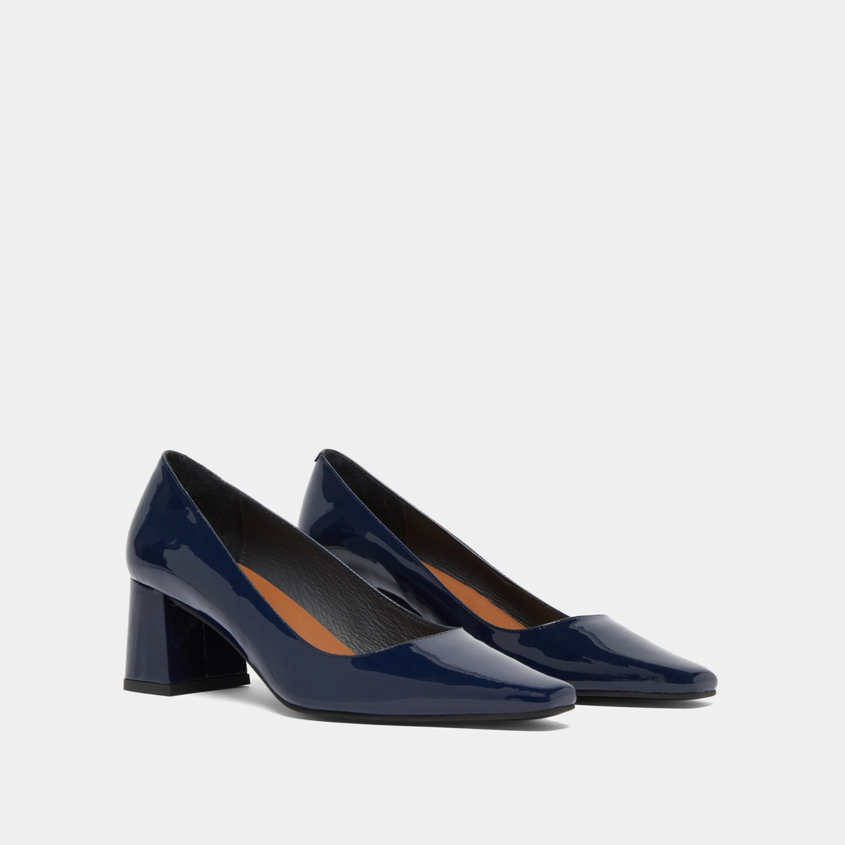 Heeled pumps in blue patent | DULINA