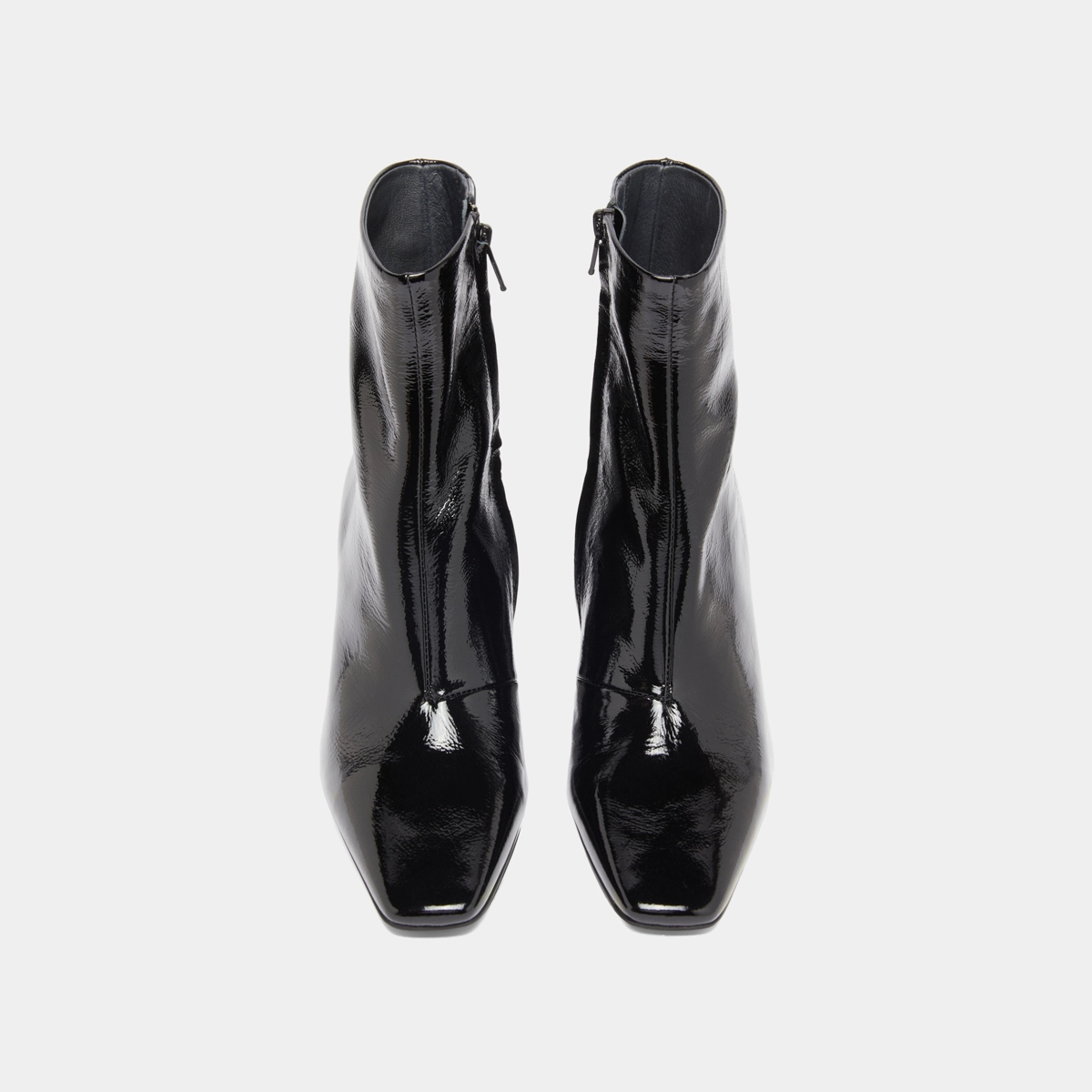 Pointed-toe ankle boots in black pleated patent | DALIBAR