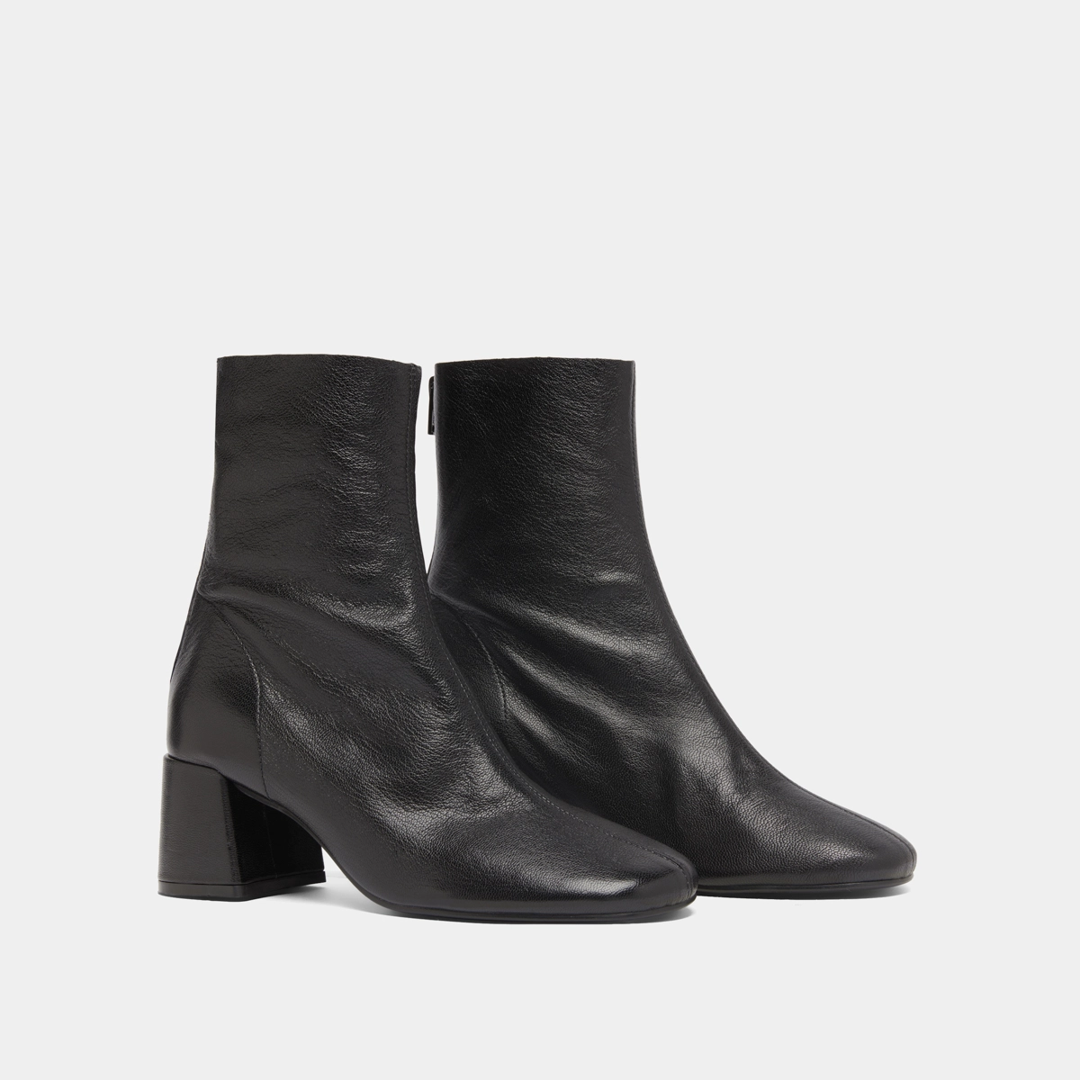 Ankle boots with rear zips in black grained leather | DENONIE