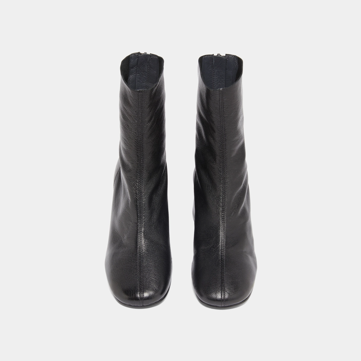 Ankle boots with rear zips in black grained leather | DENONIE