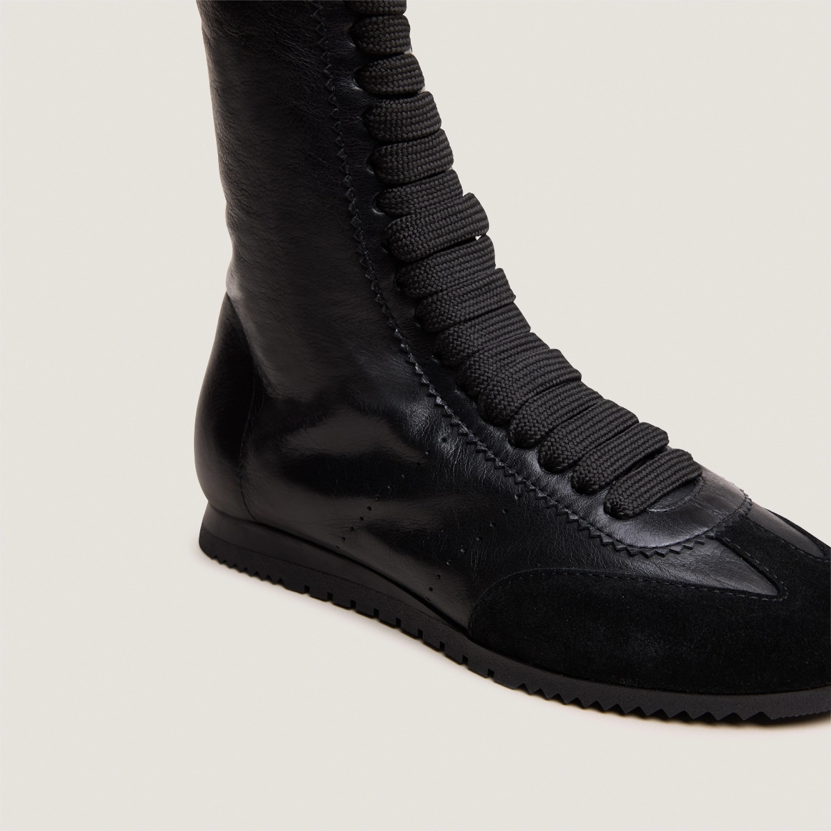 High lace-up sneakers in black suede and black leather | DOUBONE