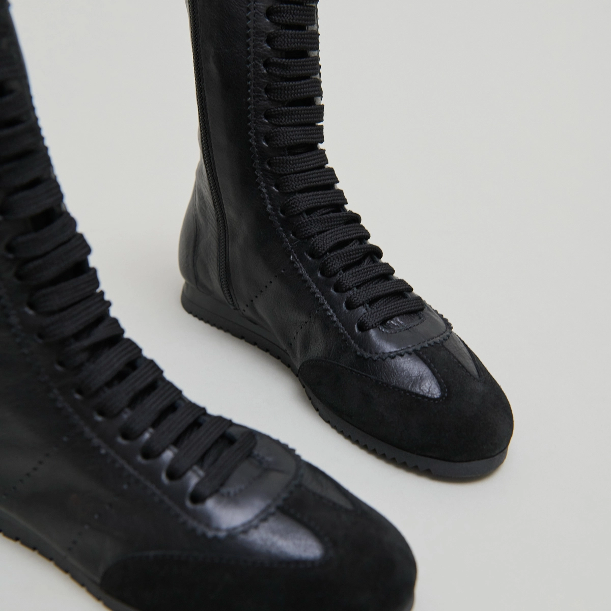 High lace-up sneakers in black suede and black leather | DOUBONE