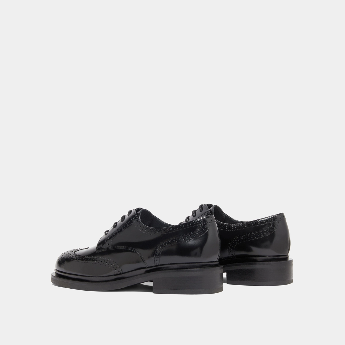 Openwork Derbies in black glazed leather | DUERMO