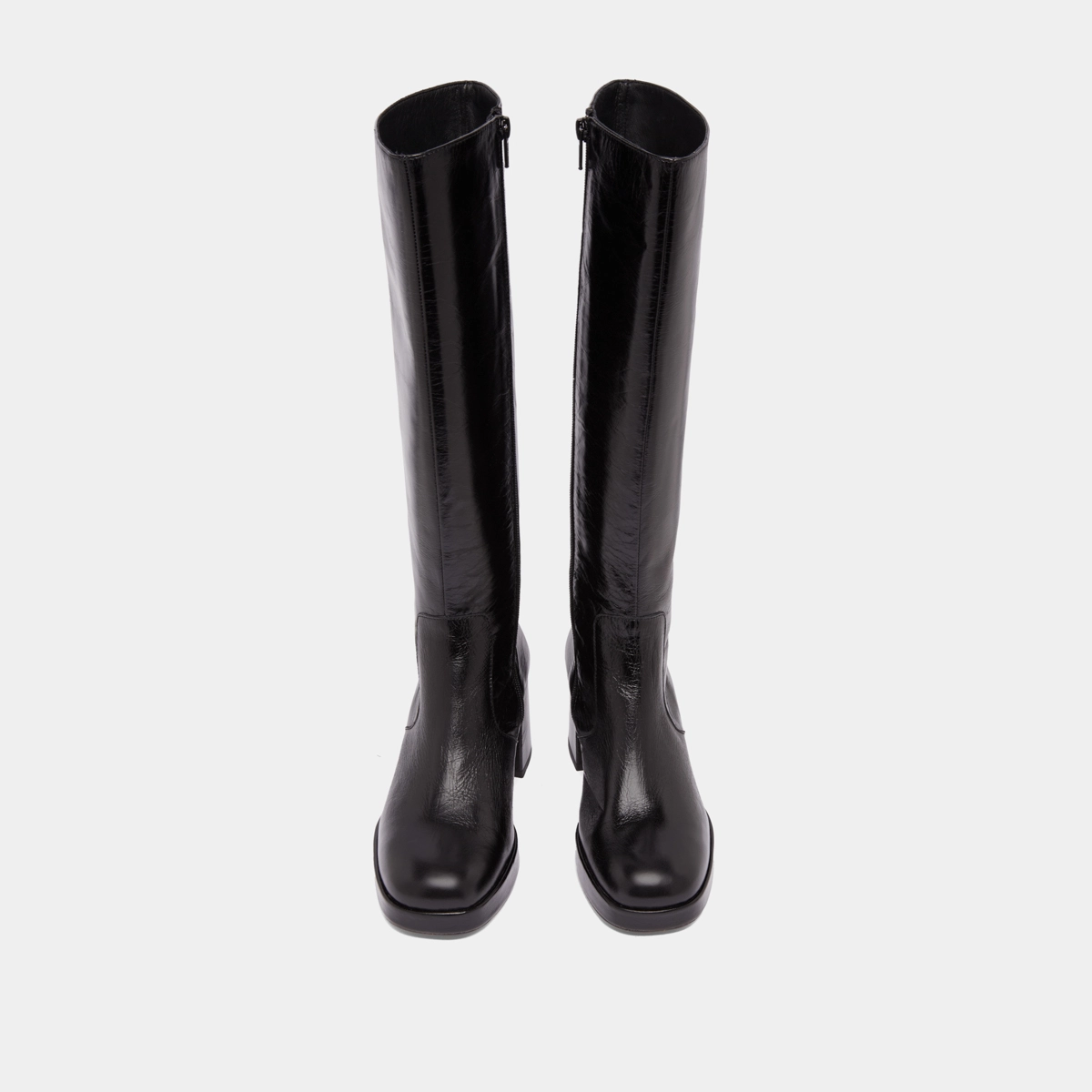 Heeled platform boots in black distressed leather | VANEO