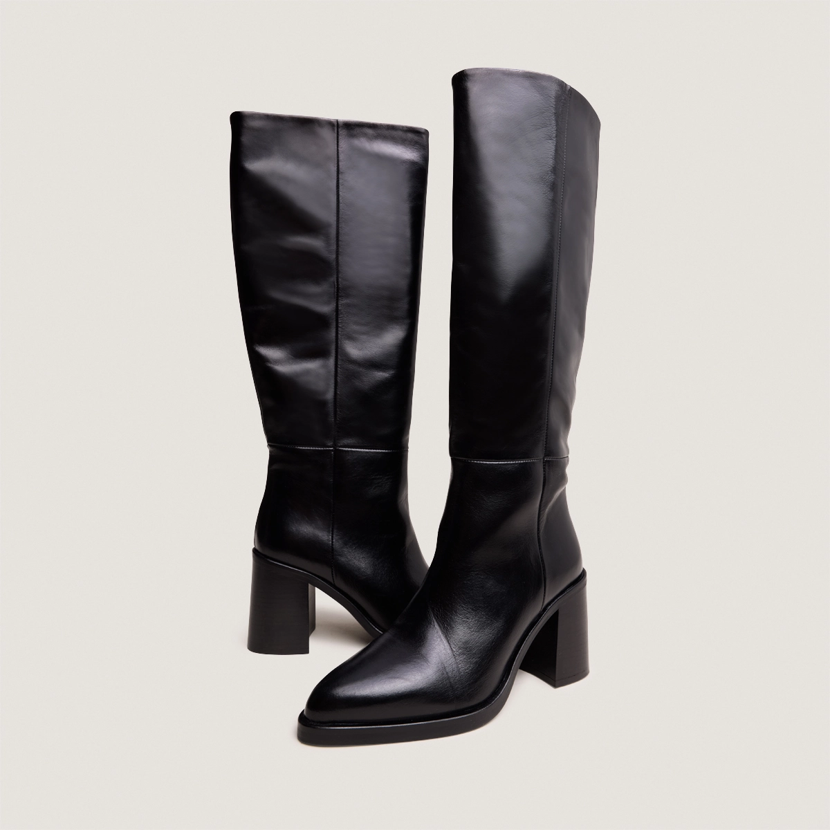 Boots with laminated heels in black leather | DICKINSON