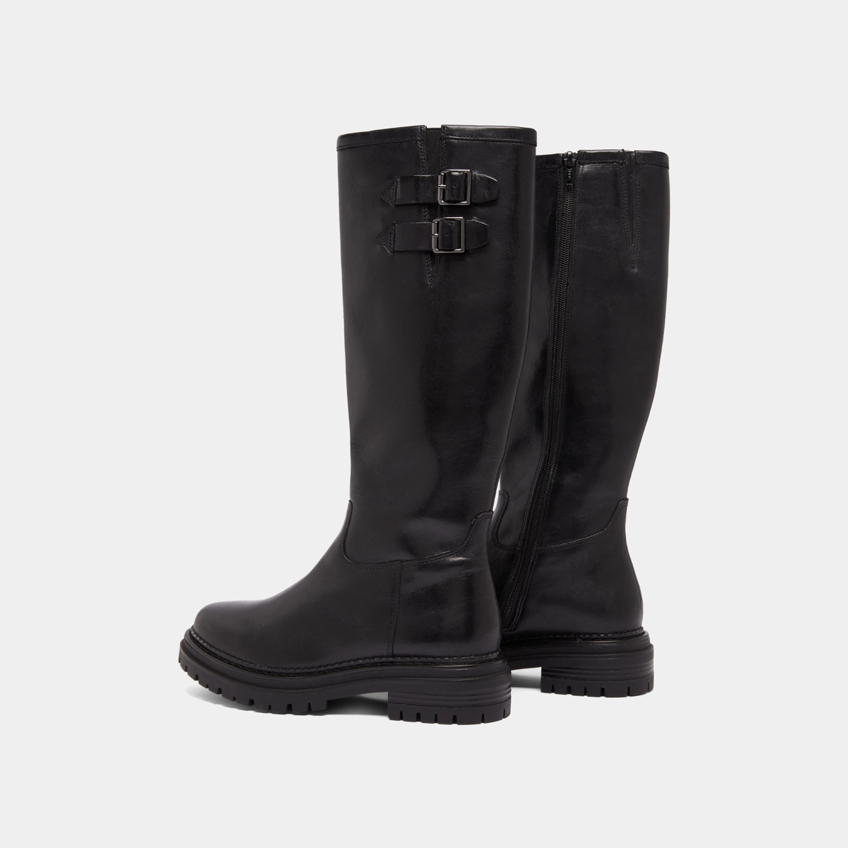 High boots with notched soles and buckles in black leather | ADALIA