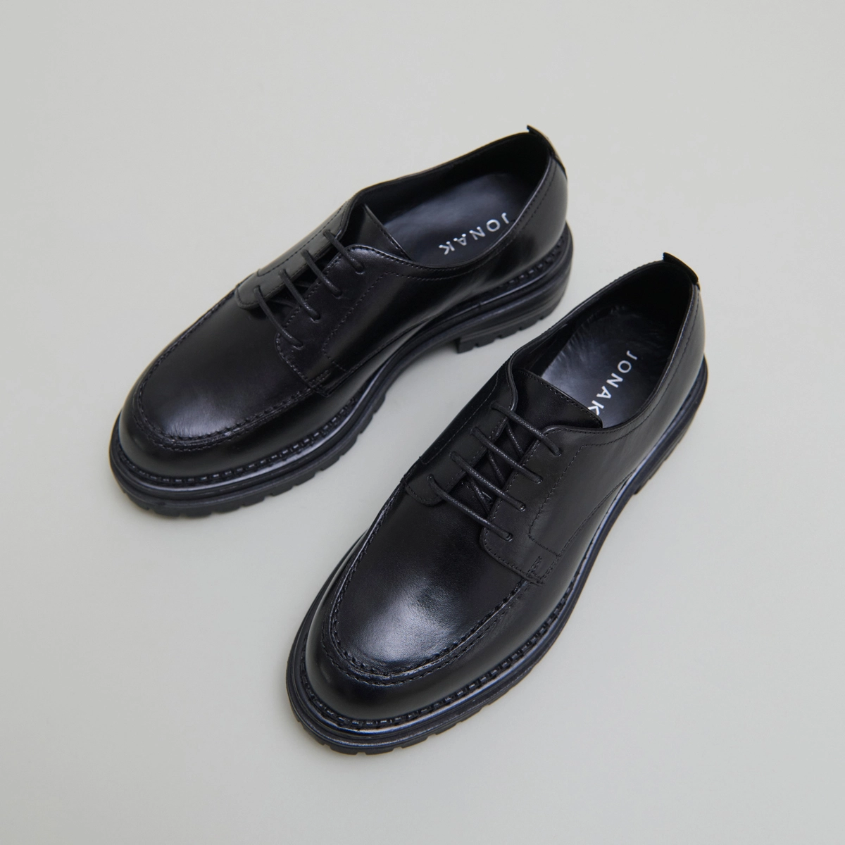 Derbies with notched soles in black leather | ADALOU