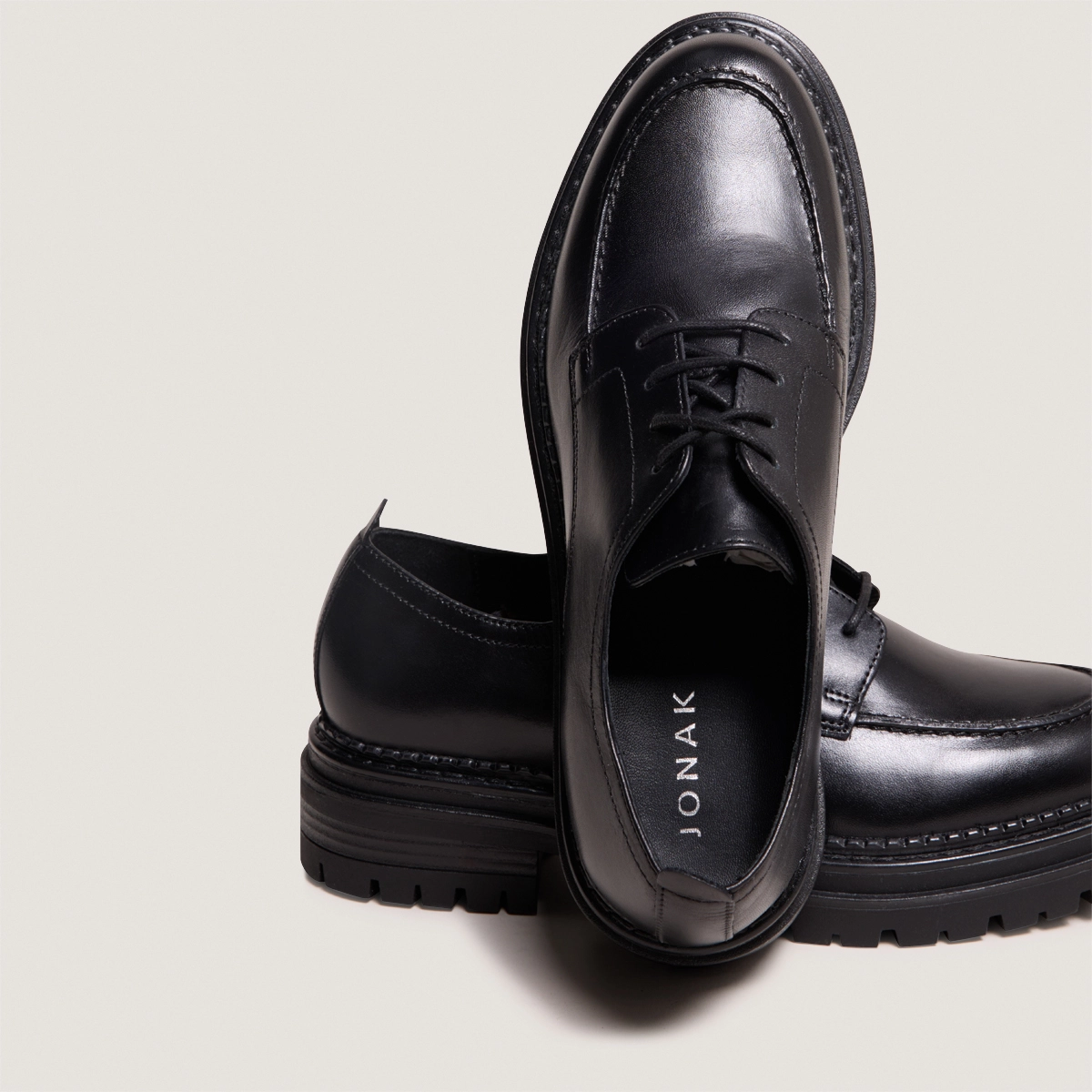 Derbies with notched soles in black leather | ADALOU