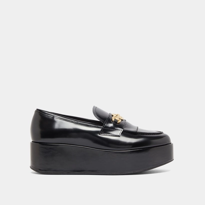 Gold buckle loafers in black glazed leather | delphes