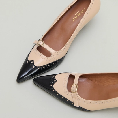 Pumps with straps and perforated details in black patent and beige leather | dalta