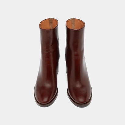 Ankle boots with heels in brown patinated leather | deep
