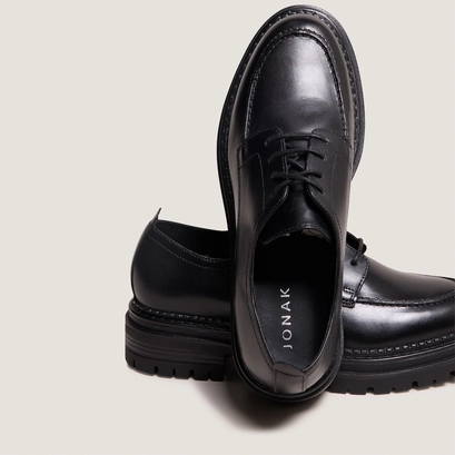 Derbies with notched soles in black leather | adalou