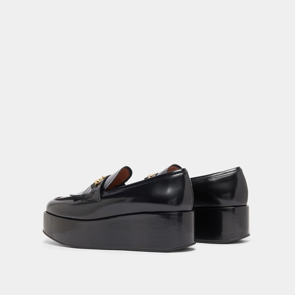 Gold buckle loafers in black glazed leather | DELPHES