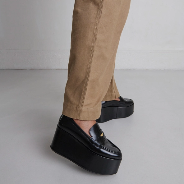 Platform loafers in black glazed leather | DOPO