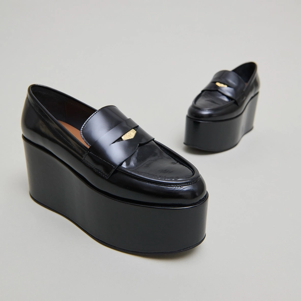Platform loafers in black glazed leather | DOPO