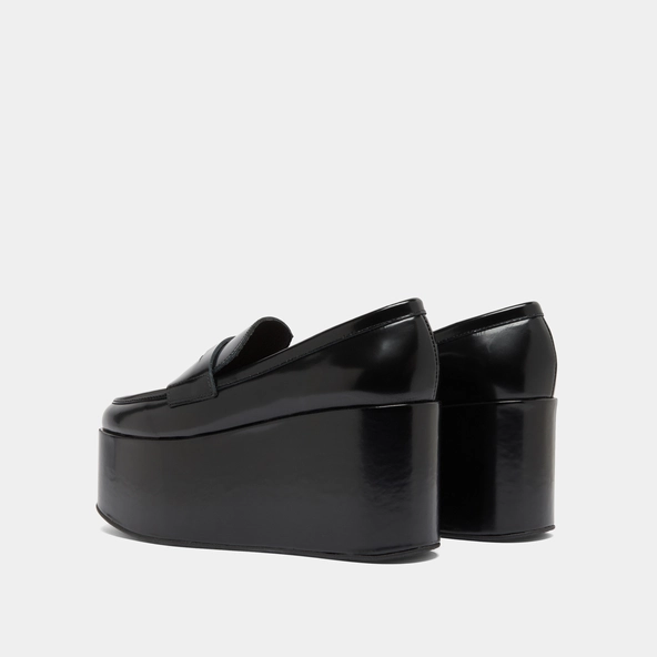 Platform loafers in black glazed leather | DOPO