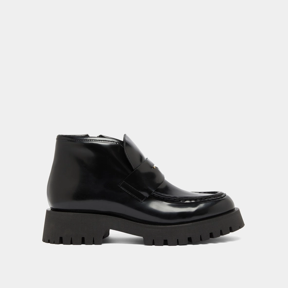 Lowboots with gold details in black glazed leather | DESK