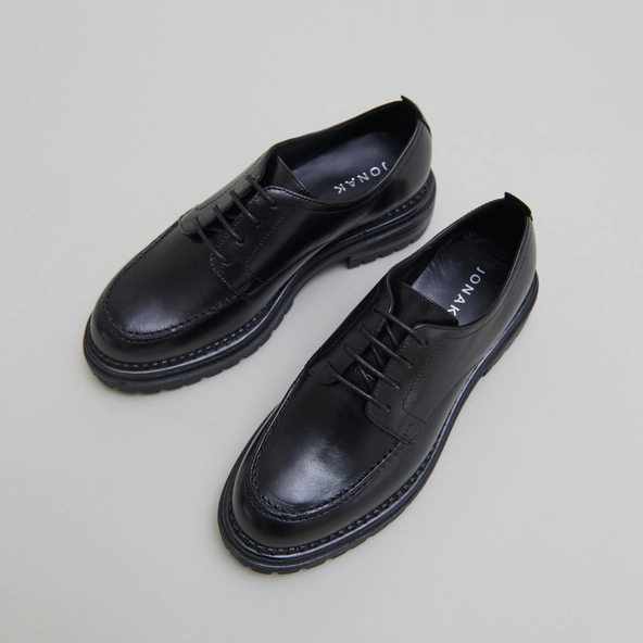 Derbies with notched soles in black leather | ADALOU