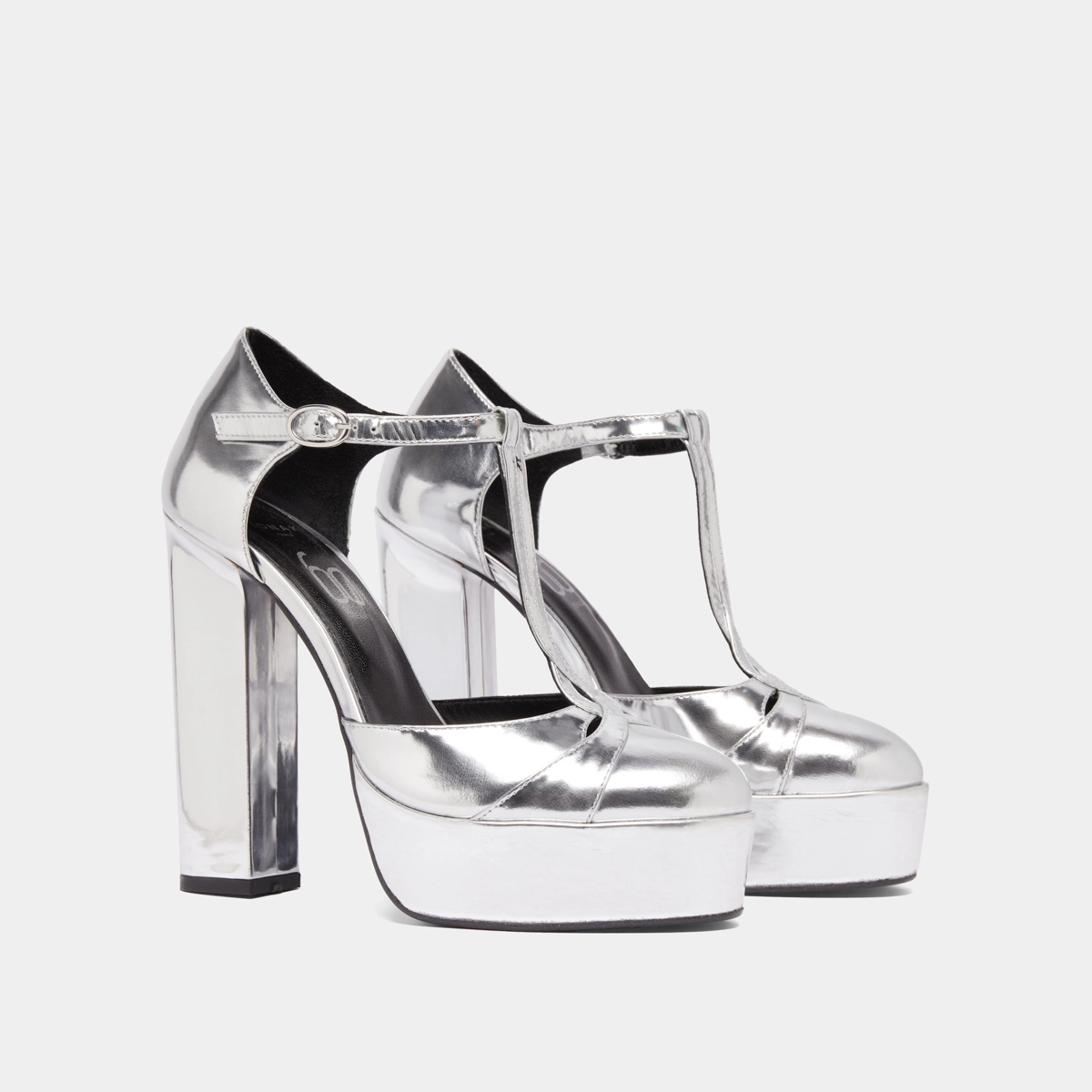 Heeled T-bar and platforms in silver metallic leather | REWIND