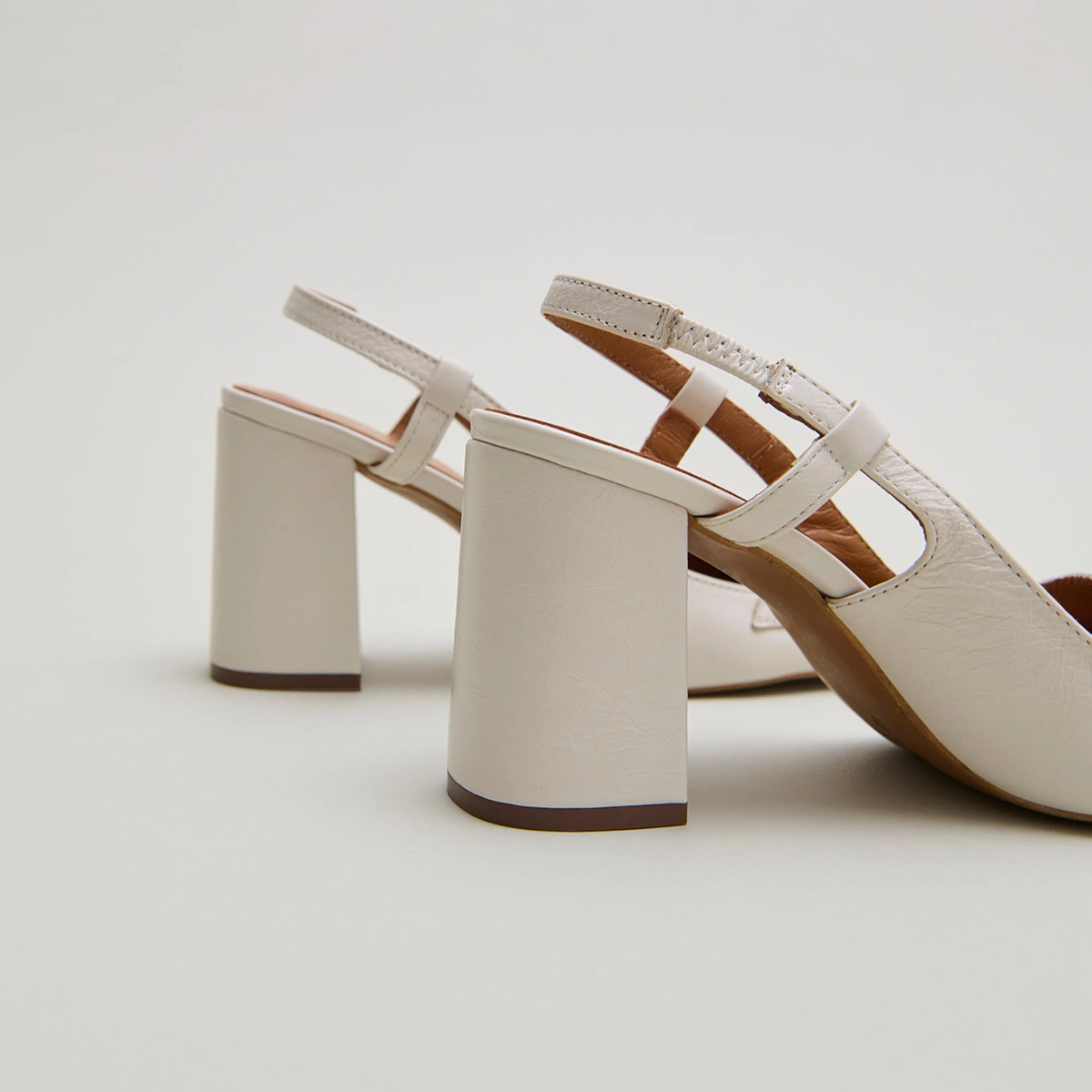 Slingbacks with gold bits in ecru distressed leather | BASEL