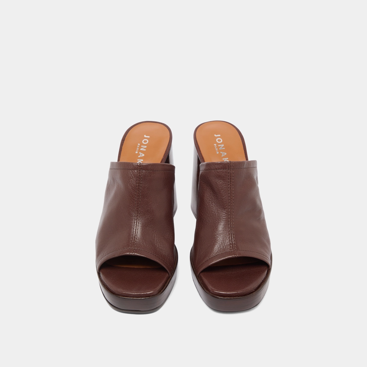 Heeled mules in brown leather | BAYA
