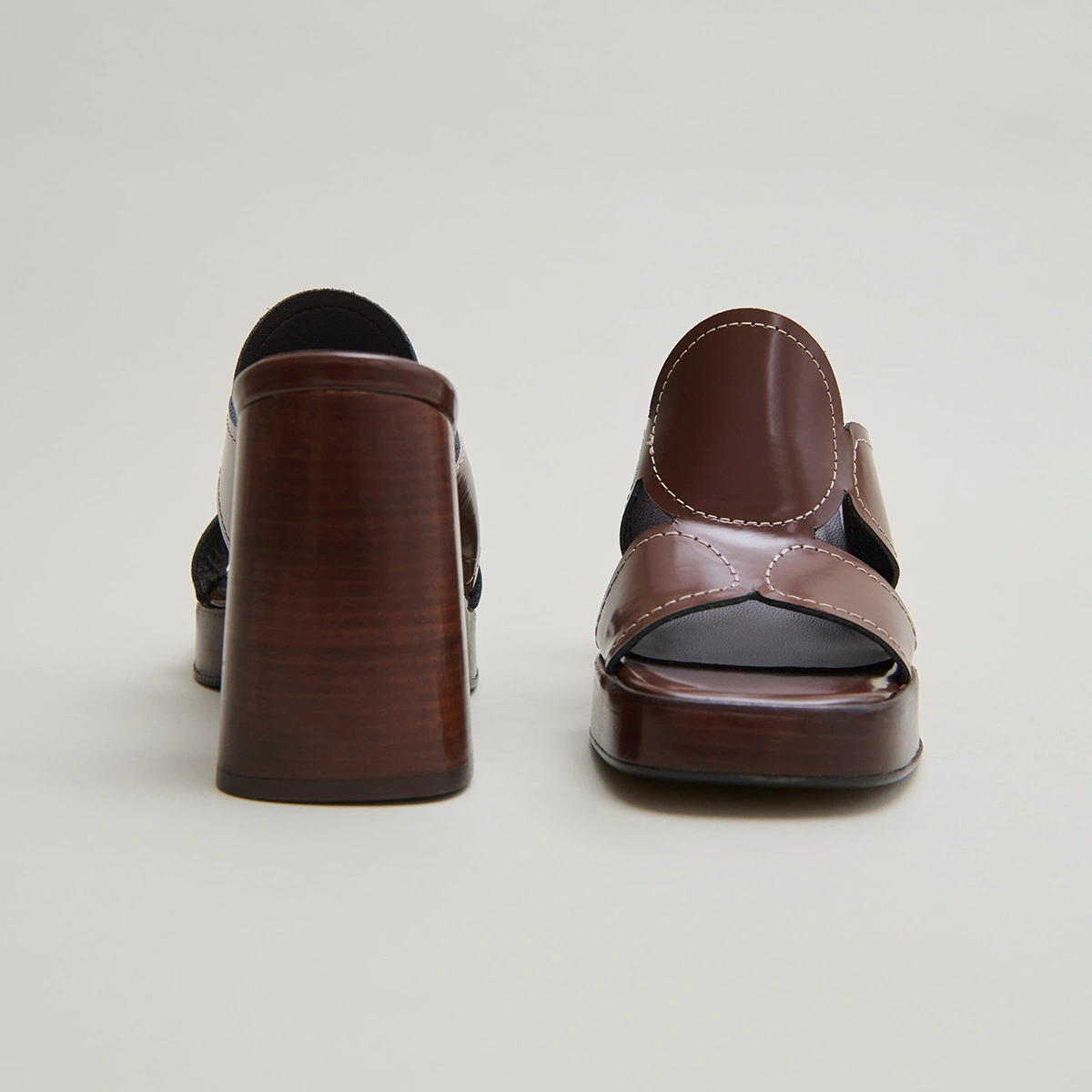 Heeled mules in brown glazed leather | BELLE