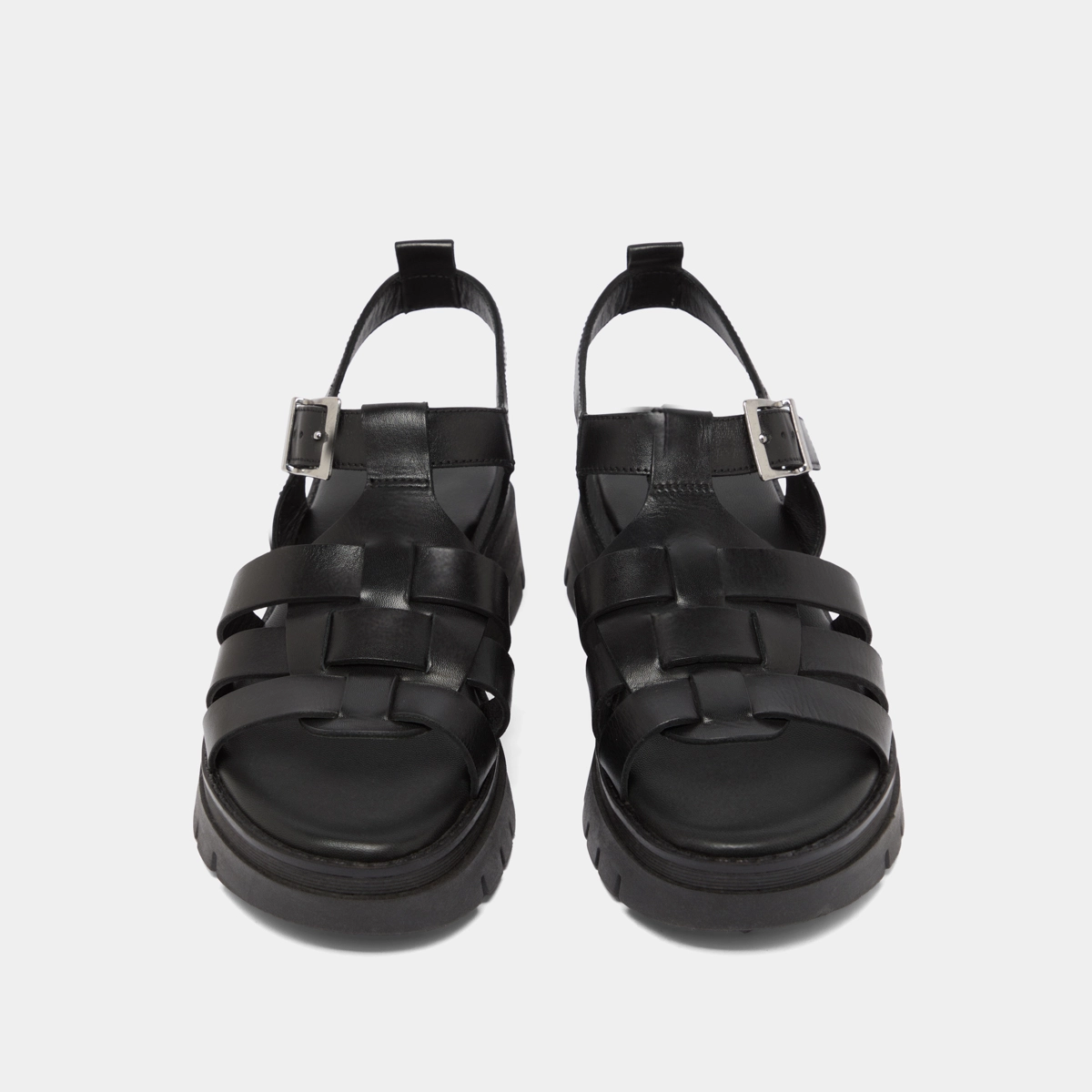 Sandals with notched soles in black leather | ANASTASIA