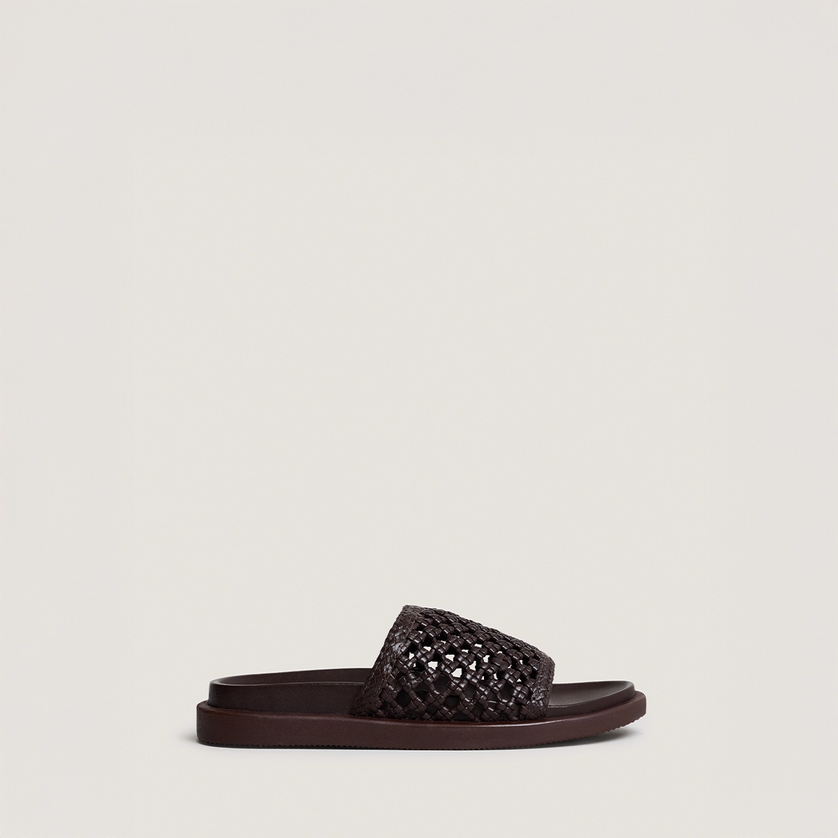 Openwork mules in dark brown leather | WOZART