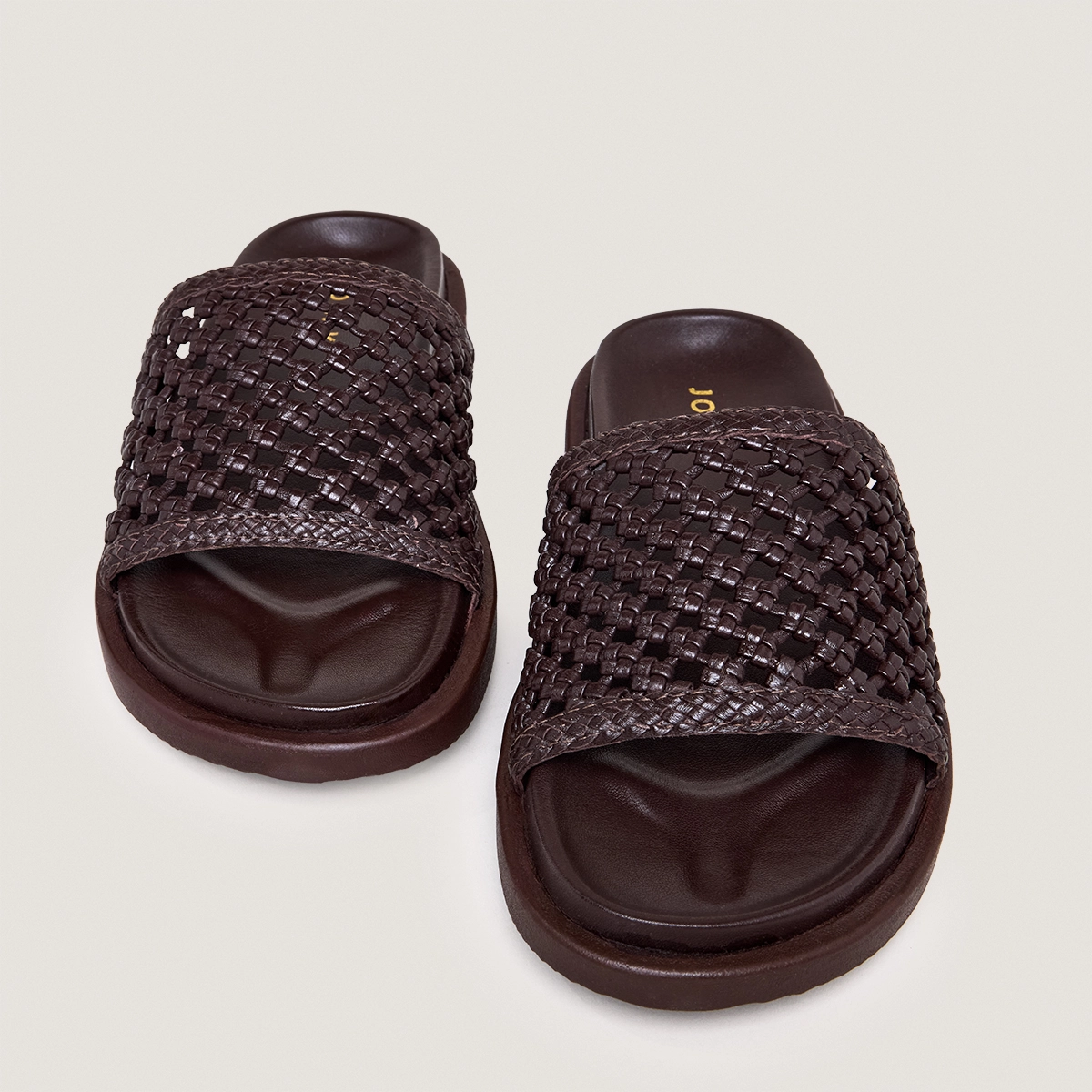 Openwork mules in dark brown leather | WOZART