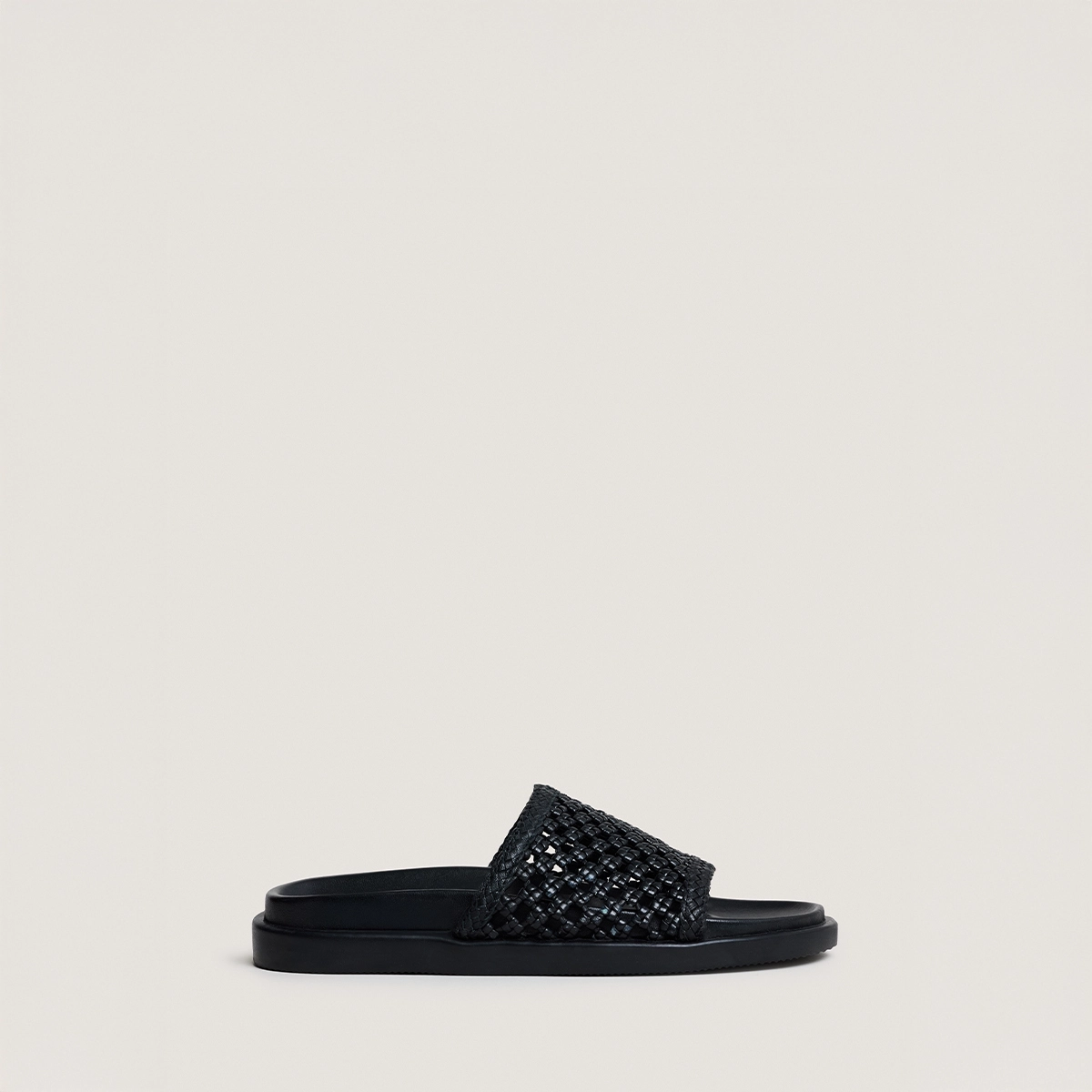 Openwork mules in black leather | WOZART