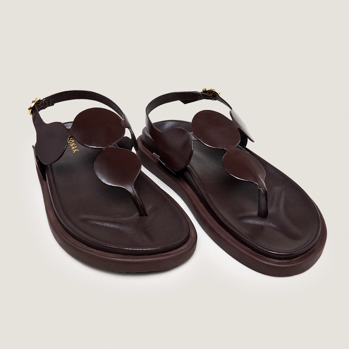 Sandals with adjustable straps in dark brown leather | WIND